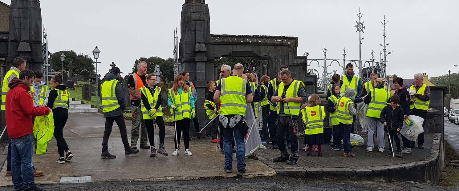 Volunteers putting on visibility vests